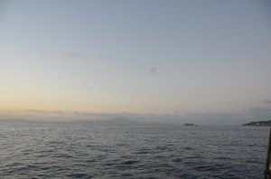 Passing through the narrow Straights of Gibraltar, Morocco on the left and Spain on the right.
