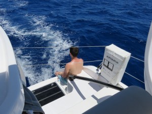 David reaching out to the fish.